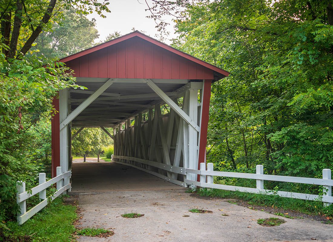 Cuyahoga Falls, OH - Bridge With Red Roof in a Green Park